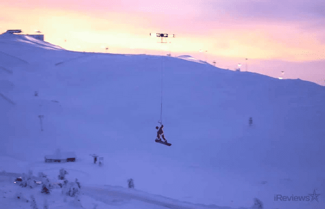 Big Air Snowboarding via Human-Carrying Drone